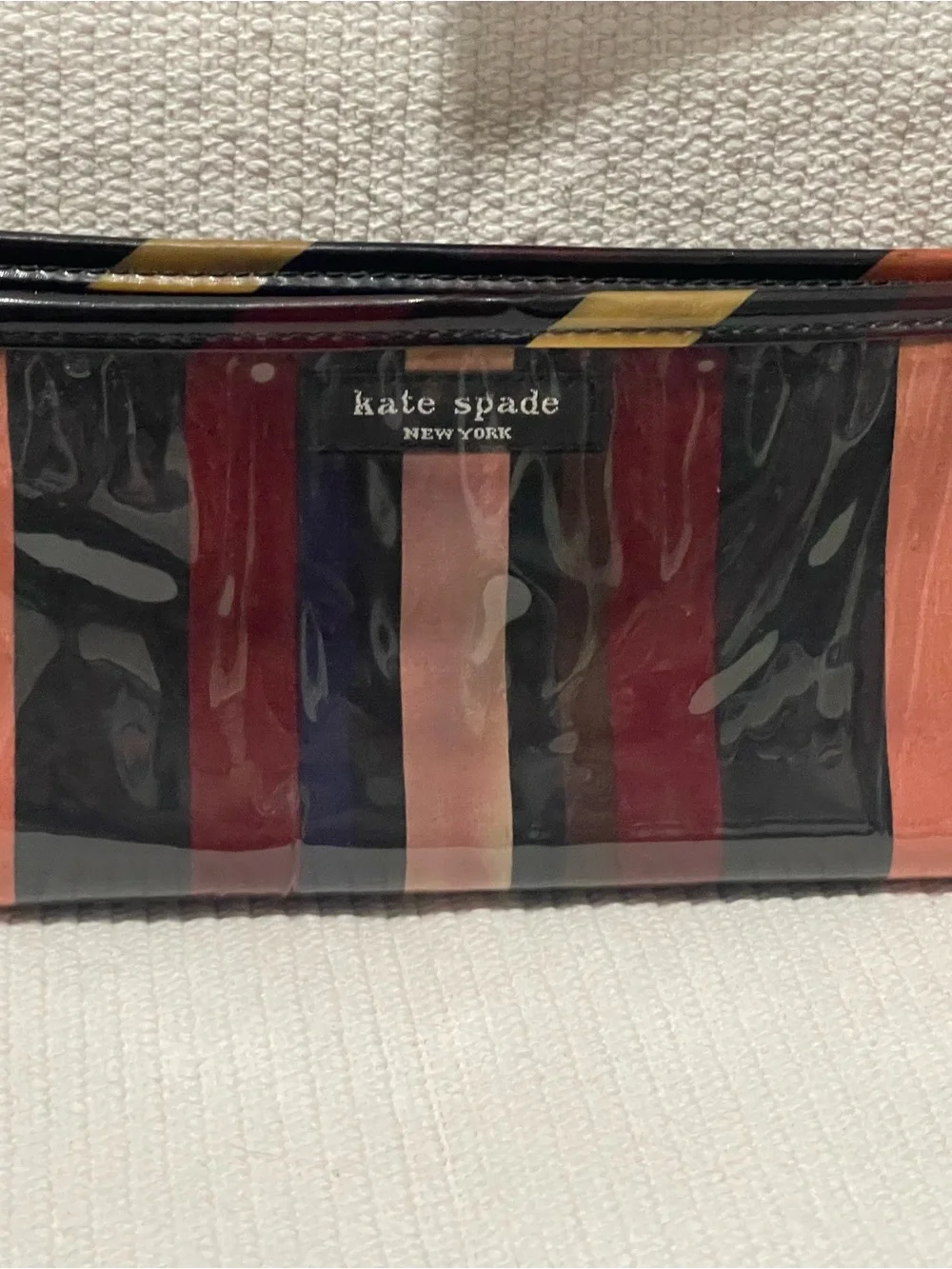 kate spade Glossy Multicolor Striped Wristlet in Black, Red, Navy, Pink & Coral